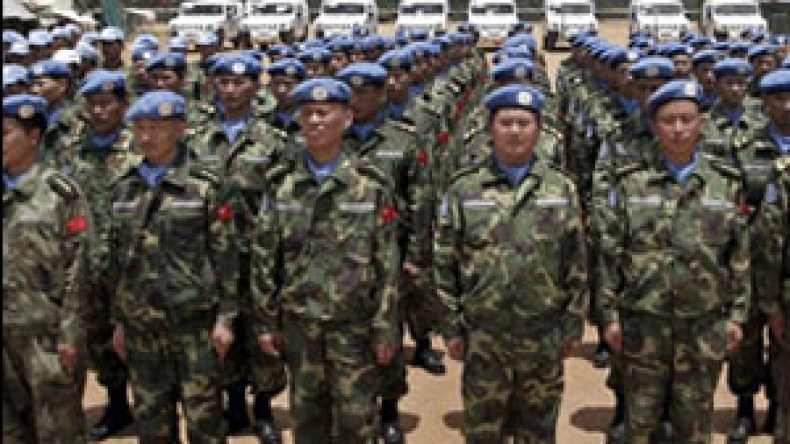 عباس يطالب بالقوات الدولية وحماس تتوعدها بالحرب