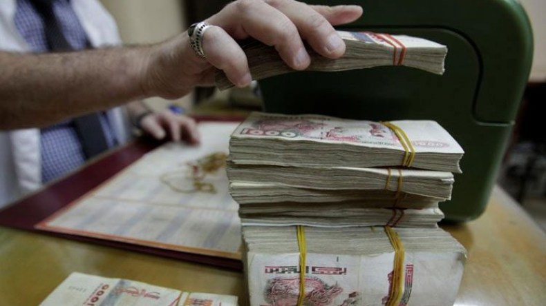 خفض آخر لقيمة الدينار لتفادي الاستدانة وطبع النقود 