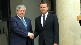 ماكرون يستقبل أويحيى ويهدد الفصائل الليبية المتمردة