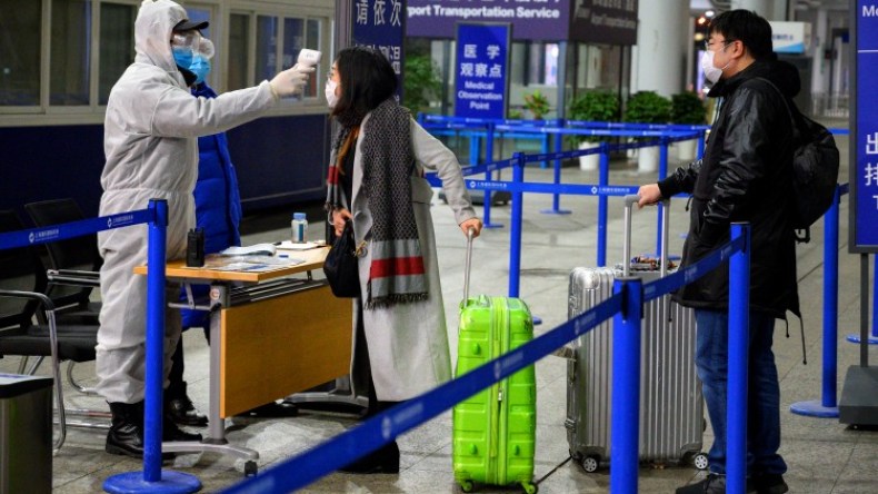 الصين تُغلق مزيداً من المدن لاحتواء فيروس كورونا