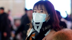 الصين تغلق مدينتين بعد انتشار فيروس كورونا