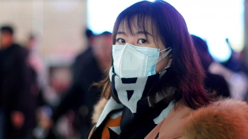 الصين تغلق مدينتين بعد انتشار فيروس كورونا