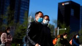 الصين تراجع إحصائيات كورونا وترامب يشكك