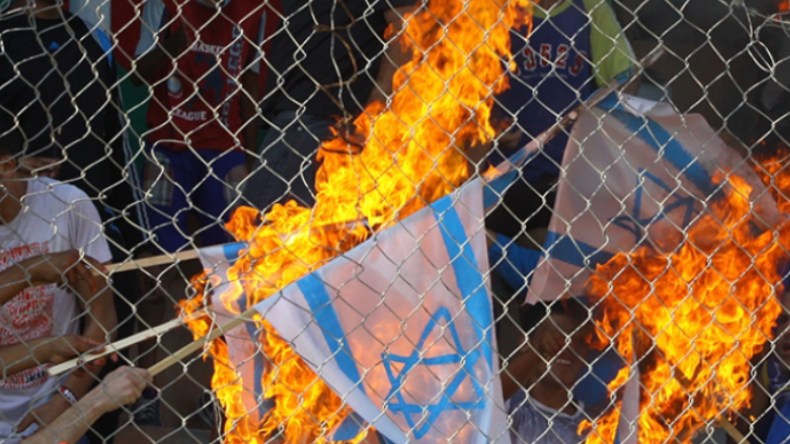 السِّجن لمن يحرق عَلم بني صهيون!