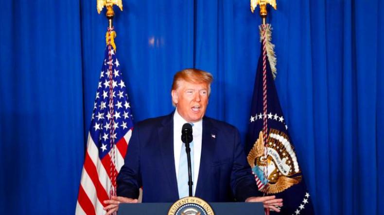 ترامب يهدد بضرب 52 موقعاً إيرانياً