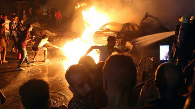 19 قتيلا في انفجار سيارات وسط القاهرة