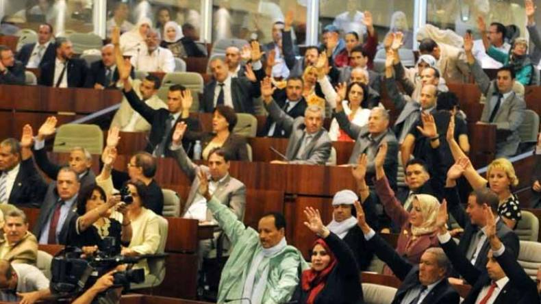 مختصون: قانون الكوطة في المجالس المنتخبة إهانة للمرأة