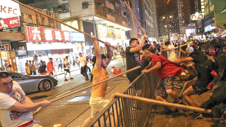 بكين تتهم واشنطن بالتآمر ضدها مع عناصر إجرامية