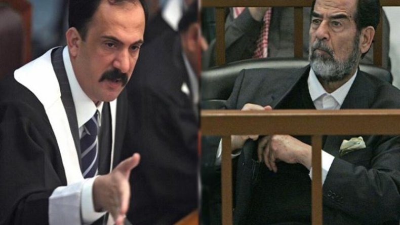 شاهد.. صورة صدّام حسين على أرضية بيت عزاء قاض حاكمه     