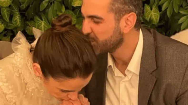 ابنة أصالة نصري تثير ضجة بطبعها قبلة على يد عريسها!