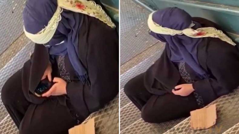 بالفيديو.. متسولة تستخدم آيفون 11 بروماكس بأحد شوارع إسطنبول!