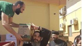 صورة للكاهن المصري المقتول تثير الجدل عبر شبكات التواصل