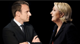 بالفيديو.. ماكرون يهاجم لوبان من خلال فتاة محجبة