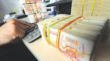  الدينار الجزائري بين البنك والسكوار وبطاقات الدفع