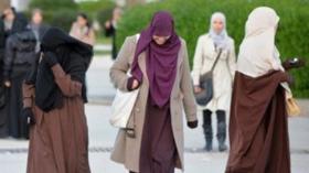 فرض الحجاب على الليبيات.. هجوم على العفو الدولية بعد بيانها بشأن الطرابلسي!