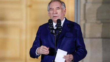 How does the French Prime Minister in charge of colonialism and immigration view it?