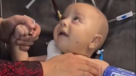 شاهد فيديو لرضيع فلسطيني بترت ساقه بالكامل