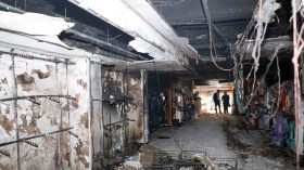 بالصور.. إخماد حريق بمركز تجاري ببوفاريك  