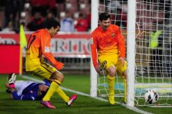 برشلونة يهزم غرناطة بثنائية ميسي