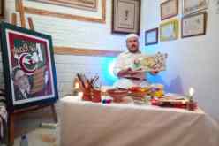 بالصور.. فنان يُهدي لوحته الرملية لأول من ينتخب بالمركز الرئيسي بغرداية