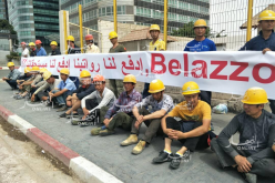 بالصور والفيديو.. عمال صينيون يحتجون أمام عمارات موبيلار بوهران