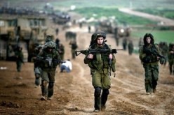 اسرائيل تهدد باجتياح غزة إذا واصلت حماس التسلح