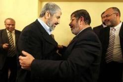 الرئيس المصري محمد مرسي يلتقي خالد مشعل