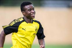 طفل ألماني كاميروني يلعب دوليا