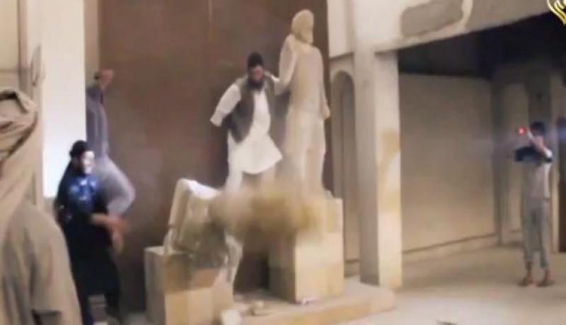 بالصور  داعش يهدم آثار في العراق