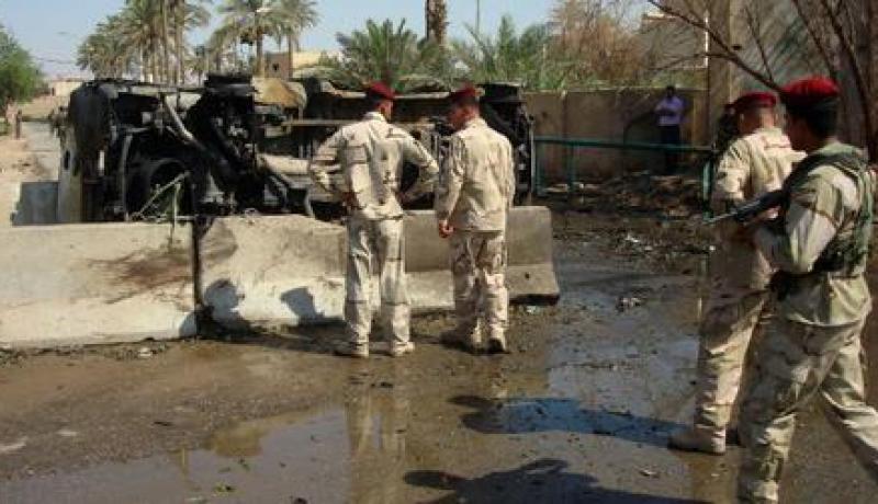 مقتل اكثر من 20 شخصا في تفجير سيارتين مفخختين ببغداد