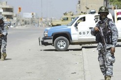 مقتل العشرات من السجناء ورجال الشرطة في أحد سجون بغداد