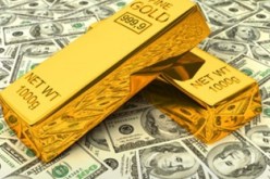 الذهب يتراجع تحت ضغط صعود الدولار