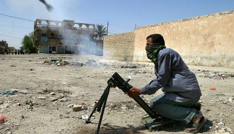ميلشيا عراقية: سنهاجم مصالح أمريكية إذا وجهت واشنطن ضربة عسكرية لسوريا