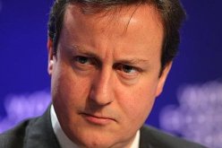 كاميرون يدافع عن خطة خفض عدد قوات بلاده في أفغانستان