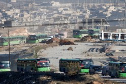 تعليق عمليات إجلاء المسلحين وعائلاتهم بحلب بسبب إطلاق النار