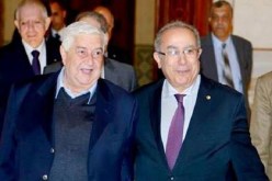 المعلم يؤكد أن الحكومة السورية ستشارك في مفاوضات جنيف السويسيرية