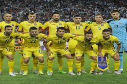 بالصور لاعبو رومانيا يرتدون قمصانًا غريبة أمام إسبانيا