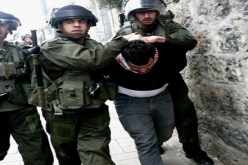 اعتقال 15 فلسطينيا بالضفة الغربية