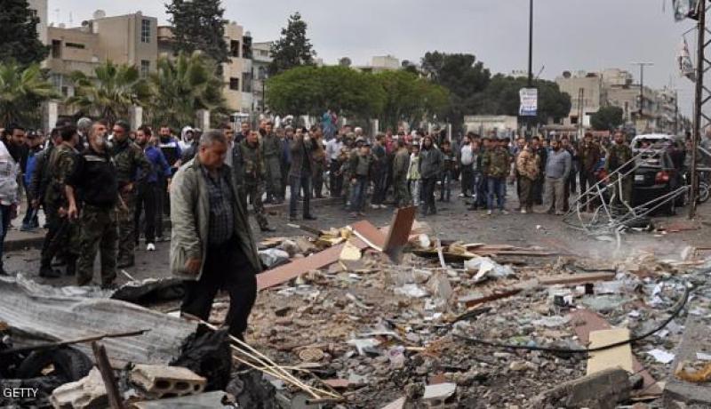 عشرات الجرحى بتفجيرين بحمص وقتلى بمضايا