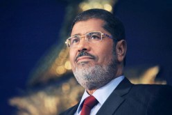 مرسي يُلبـس قادة الإخوان النِقاب والحجاب