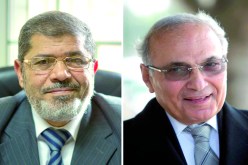 المصريون‮ ‬يختارون بين مرسي‮ ‬وشفيق لرئاستهم‮   ‬