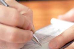 التعامل بالصكوك البنكية رسميا بداية 2014