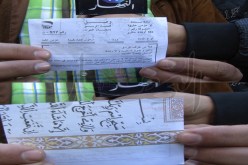 طبع وصولات استلام الرسائل ببريد الجزائر‮ ‬على صفحات من المصحف الشريف