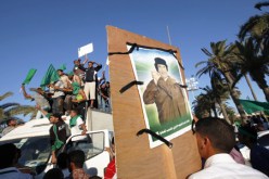 ‮‬أنصار القذافي‮ ‬يحررون بني‮ ‬وليد وفرنسا تعيد حساباتها في‮ ‬ليبيا