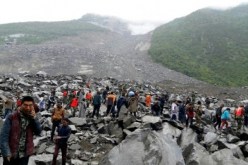 هلاك أكثر من 120 شخص في انهيار أرضي بالصين