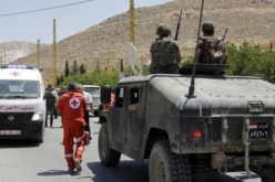 داعش يفرج عن جثتين لجندي لبناني ومدني