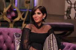 بالصور..رضيع منى زكي يرافقها في أول مهمة رسمية لها