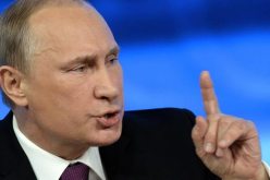 بوتين.. قتل السفير الروسي بتركيا عمل استفزازي جبان