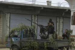 مقاتلون معارضون يحاولون اقتحام مدرسة تدريب للمشاة في الجيش السوري شمال حلب