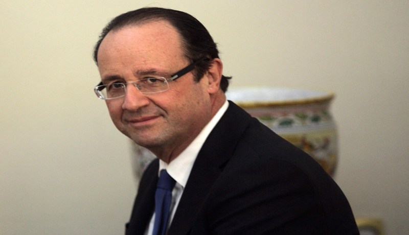 أعلام هولندا لاستقبال رئيس فرنسا‮!‬